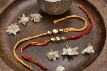 Gold tone kundan rakhi- Set of 2